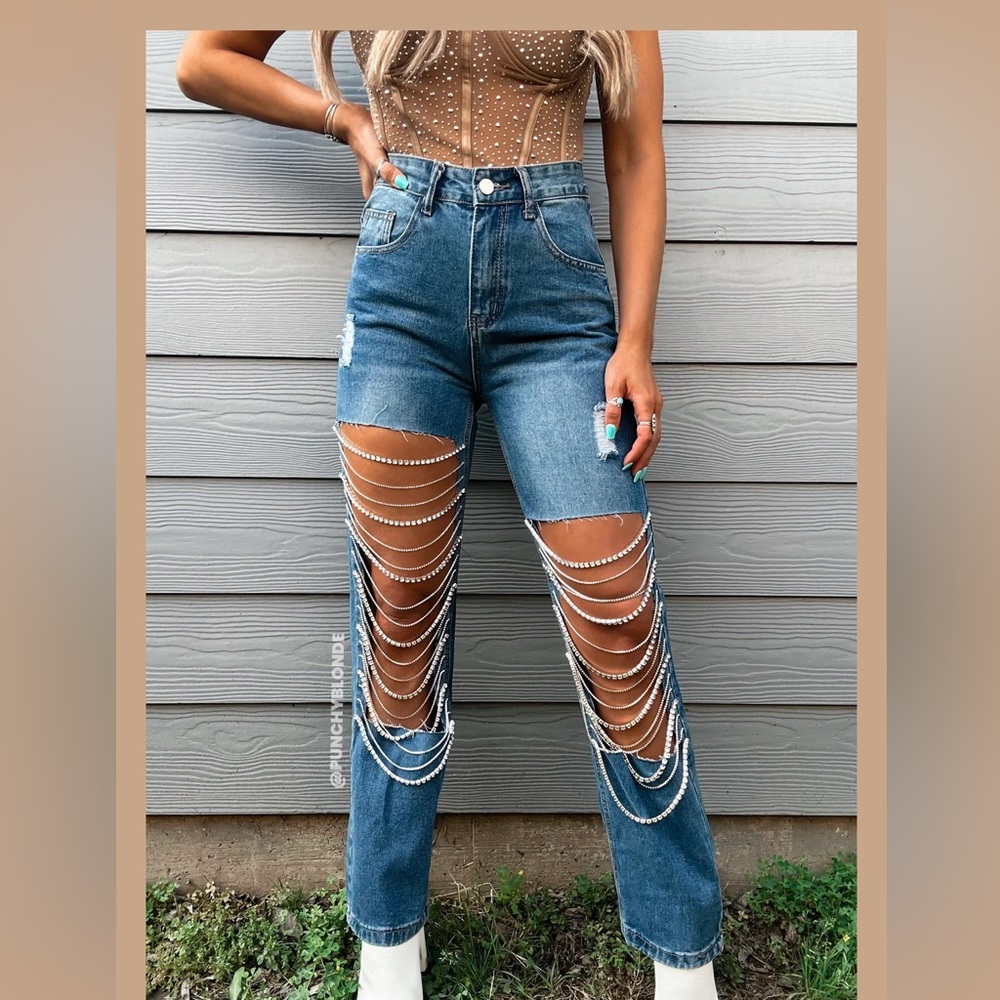 Kiwi jeans from Punchy Blonde LLC. Size medium. Never been worn.